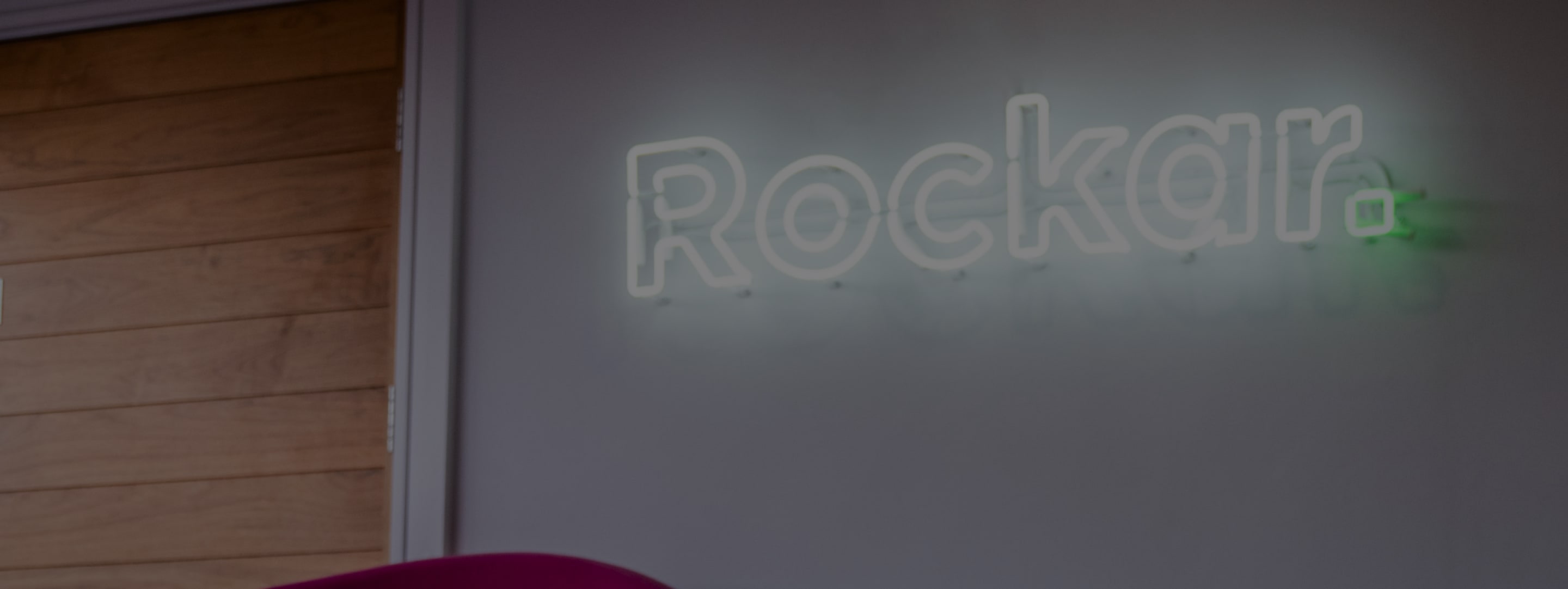 Rockar Logo in Neon on Office Wall